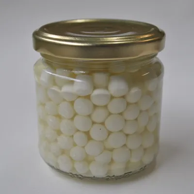 MilkBiotic A2 Labneh Balls in glass jar with golden cap